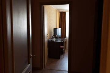 Фото номера Стандартный двухместный номер с 2 отдельными кроватями Гостиница Единство г. Череповец 6