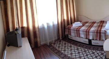 Фото номера Семейный номер Гостиница Grad Hotel г. Череповец 5