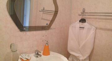 Фото номера Семейный номер Гостиница Grad Hotel г. Череповец 9